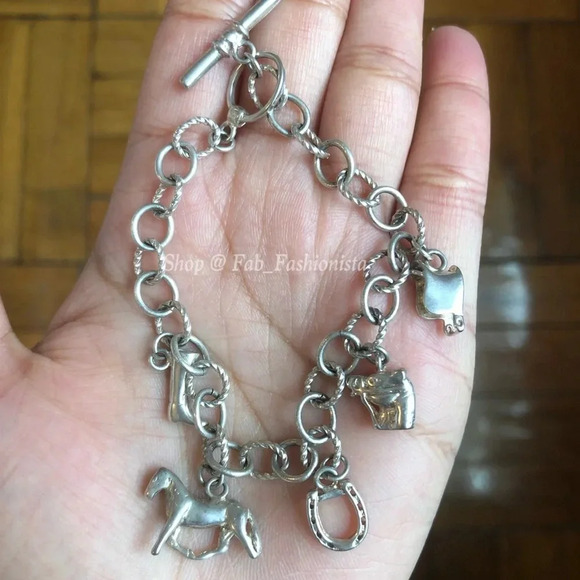 Sterling silver horse charm bracelet with 5 charms - Picture 1 of 10